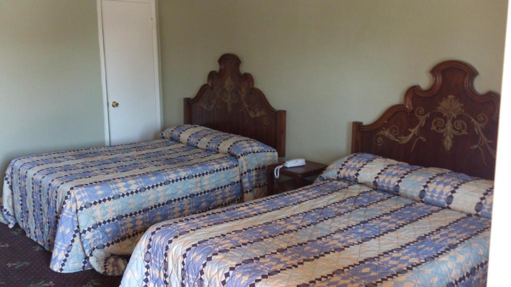 Santa Ana Travel Inn Стая снимка